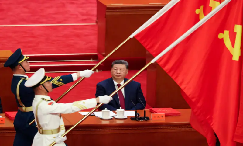 Chinese President Xi Jinping looks on as People&rsquo;s Liberation Army honour guard holds party flags during a ceremony marking the 105th anniversary of the founding of the Communist Party of China at the Great Hall of the People in Beijing, China. -- Reuters