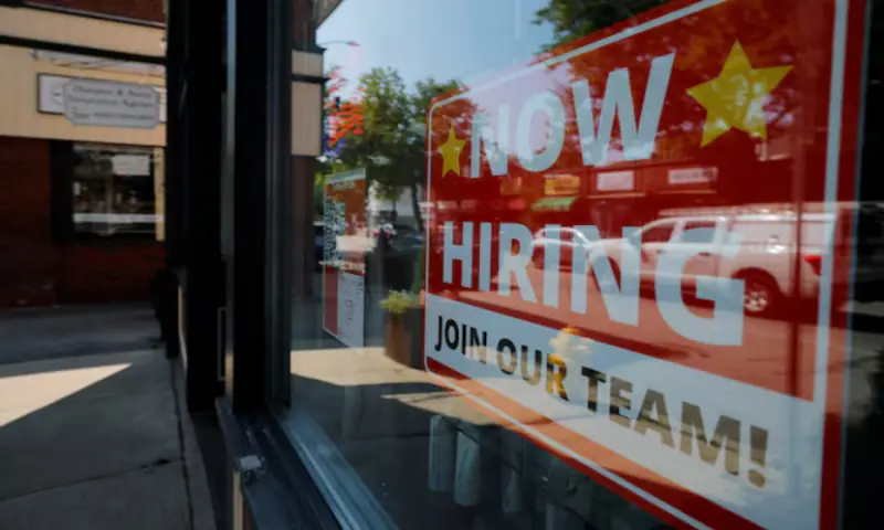 A "Now Hiring" sign hangs in the window of a hair salon in the Greater Boston town of Medford, Massachusetts, US. -- Reuters A "Now Hiring" sign hangs in the window of a hair salon in the Greater Boston town of Medford, Massachusetts, US. -- Reuters