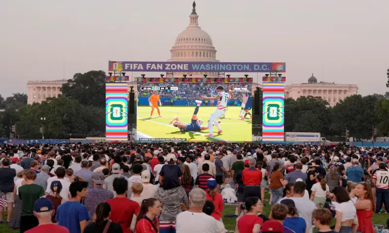 United States fans watch the match on a big screen at the National Mall as The United States Capitol building is seen in the background. -- Reuters