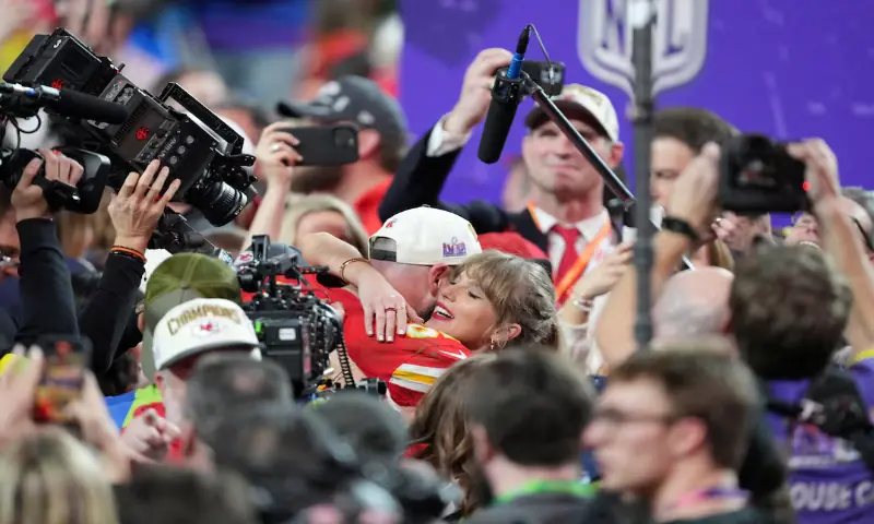 Paradise, Nevada, USA; Kansas City Chiefs tight end Travis Kelce (87) hugs recording artist Taylor Swift after winning Super Bowl LVIII against the San Francisco 49ers at Allegiant Stadium. Mandatory Credit: Kyle Terada-USA TODAY. -- Reuters
