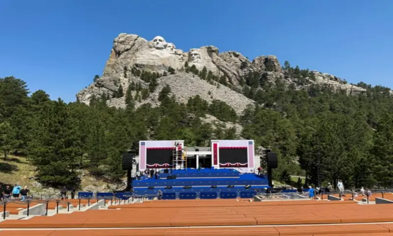 Members of the crew make final preparations as they set up a stage at Mount Rushmore National Memorial for the Fourth of July fireworks display, where U.S. President Donald Trump is expected to appear, in Keystone, South Dakota, US. -- Reuters