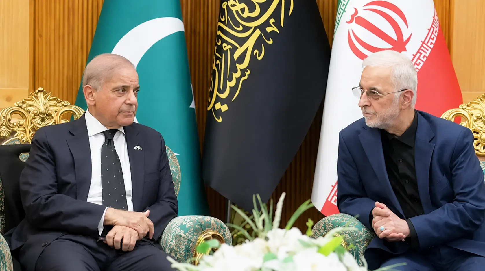 Pakistani Prime Minister Shehbaz Sharif and Iranian Interior Minister Eskandar Momeni. -- Reuters