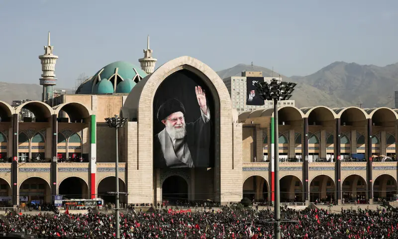 A banner with an image of late Supreme Leader Ayatollah Ali Khamenei is displayed as people gather to pay their respects to Khamenei at the Imam Khomeini Grand Mosalla, in Tehran, Iran. -- Reuters