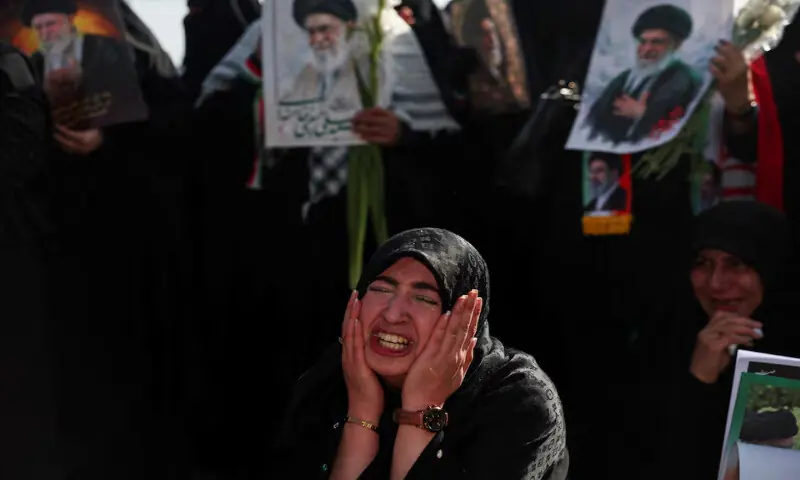 A woman reacts as mourners gather to pay their respects to late Supreme Leader Ayatollah Ali Khamenei in Tehran, Iran. -- Reuters