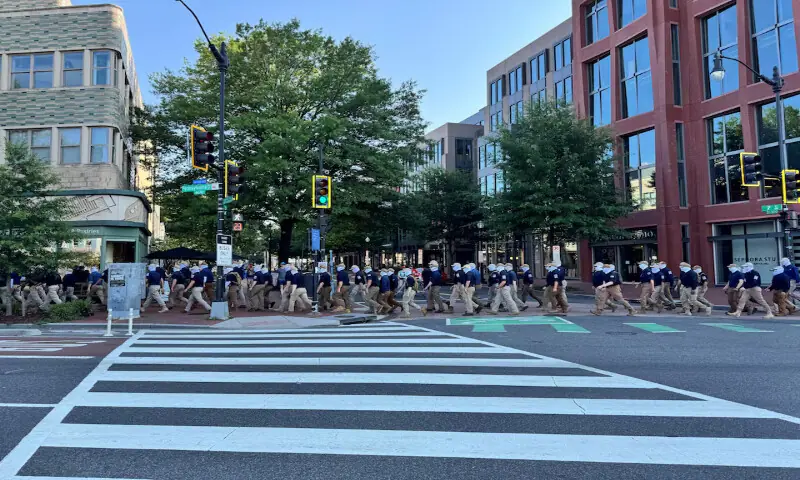 Members from the Patriot Front march on the 250th anniversary of US independence in Washington. -- Reuters