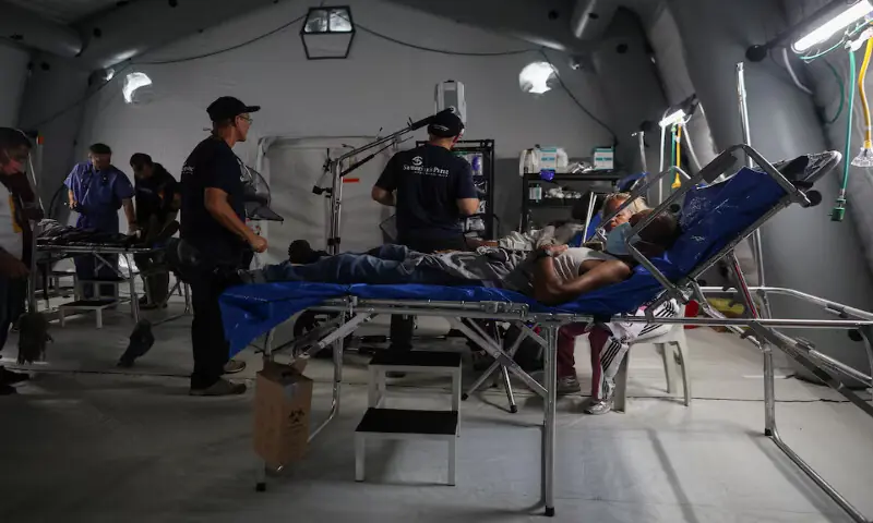 A man rests as he receives treatment at a field hospita in the aftermath of the June 24 earthquakes in La Guaira, Venezuela. -- Reuters