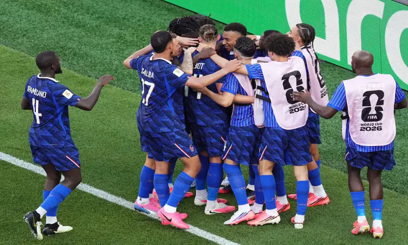 France's Kylian Mbappe celebrates scoring their first goal with teammates. -- Reuters