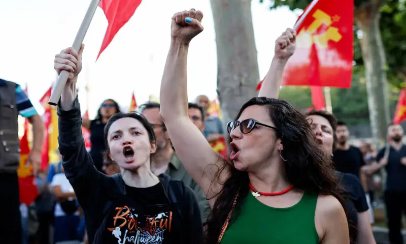 Women shout slogans during a protest ahead of NATO leaders' summit in Istanbul, Turkey. -- Reuters Women shout slogans during a protest ahead of NATO leaders' summit in Istanbul, Turkey. -- Reuters