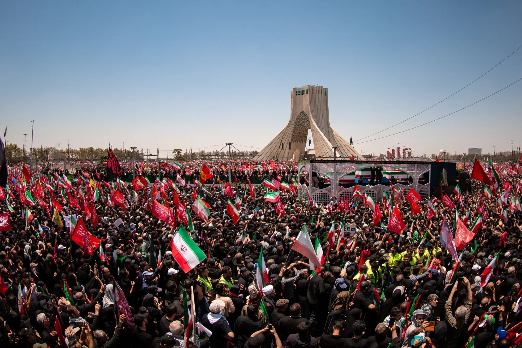 People attend a funeral procession for Iran's late Supreme Leader Ayatollah Ali Khamenei, who was killed on February 28 in Israeli and US airstrikes, in Tehran, Iran. -- Reuters
