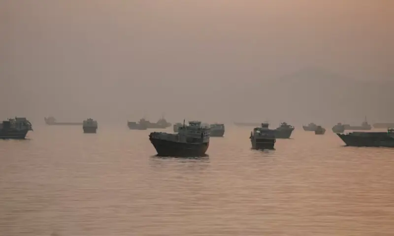 Vessels are anchored in the Strait of Hormuz as seen from Musandam, Oman. -- Reuters file
