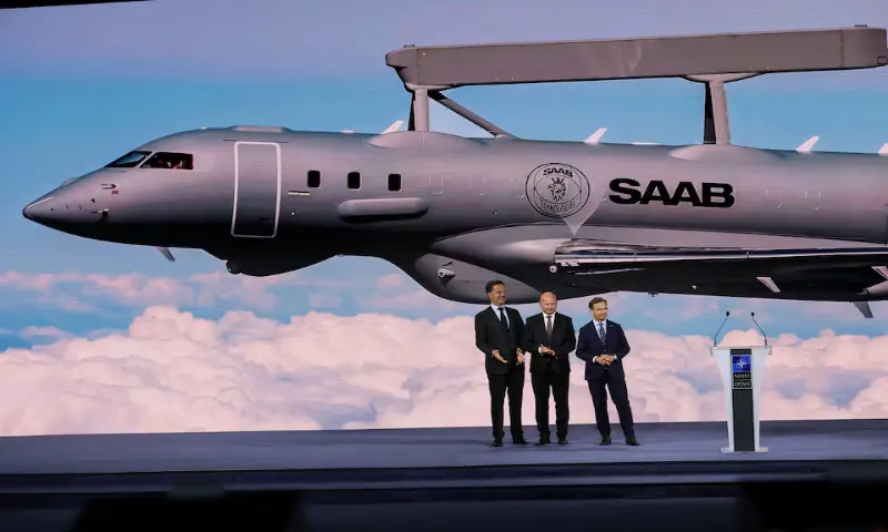 President and CEO of Saab Micael Johansson stands flanked by Sweden's Prime Minister Ulf Kristersson and NATO Secretary General Mark Rutte during the High Level Defence announcements at the NATO Summit Defence Industry Forum, on the sidelines of the NATO leaders' Summit, in Ankara, Turkey, on Tuesday. -- Reuters