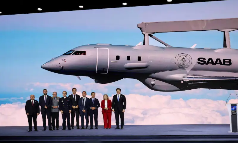 Sweden's Prime Minister Ulf Kristersson and NATO Secretary General Mark Rutte pose for a group photo during the High Level Defence announcements at the NATO Summit Defence Industry Forum, on the sidelines of the NATO leaders' Summit, in Ankara, Turkey, on Tuesday. -- Reuters