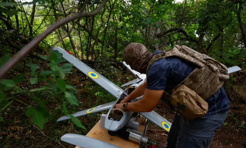 A service member of the Ukrainian Armed Forces prepares a RAM-2X strike drone at an undisclosed location in southern Ukraine. -- Reuters