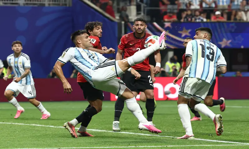 Argentina's Lautaro Martinez shoots at goal. -- Reuters
