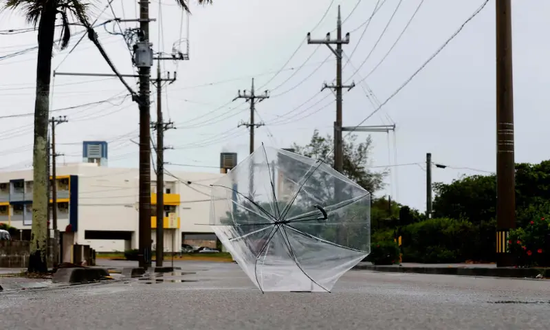 An umbrella rolls in strong winds as Typhoon Bavi approaches Ishigaki, Japan. -- Reuters