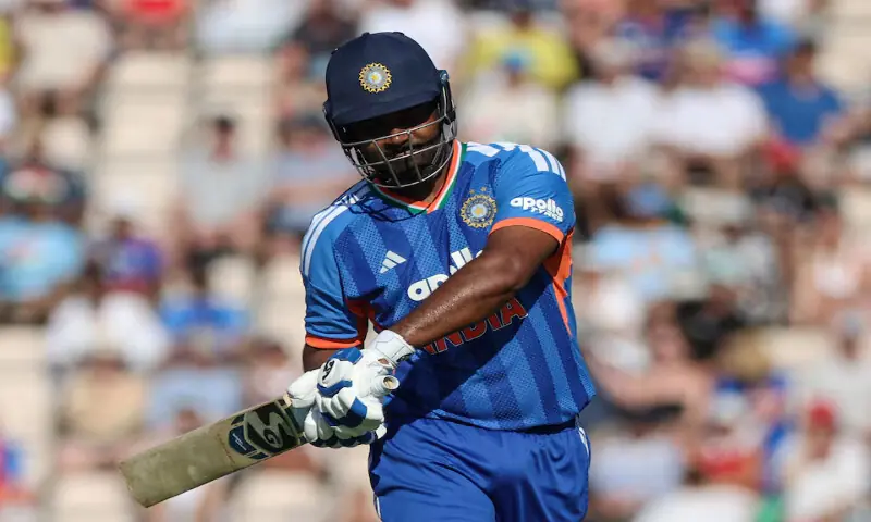 India's Sanju Samson walks after losing his wicket, caught by England's Jacob Bethell off the bowling of Sam Curran in Fifth T20 International against England at Southampton. -- Reuters India's Sanju Samson walks after losing his wicket, caught by England's Jacob Bethell off the bowling of Sam Curran in Fifth T20 International against England at Southampton. -- Reuters