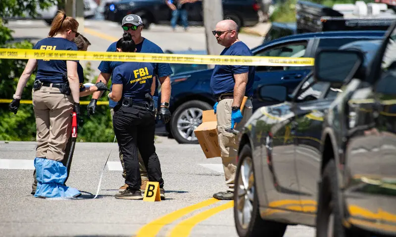 FBI investigators work the scene of an alleged ICE involved shooting in Biddeford, Maine, on July 13, 2026. AFP