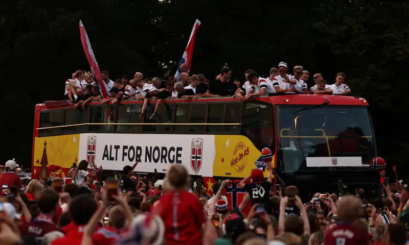 Members of the Norwegian men’s football team and their staff take part in an open-top bus parade through the streets in Oslo, Norway. -- Reuters Members of the Norwegian men’s football team and their staff take part in an open-top bus parade through the streets in Oslo, Norway. -- Reuters