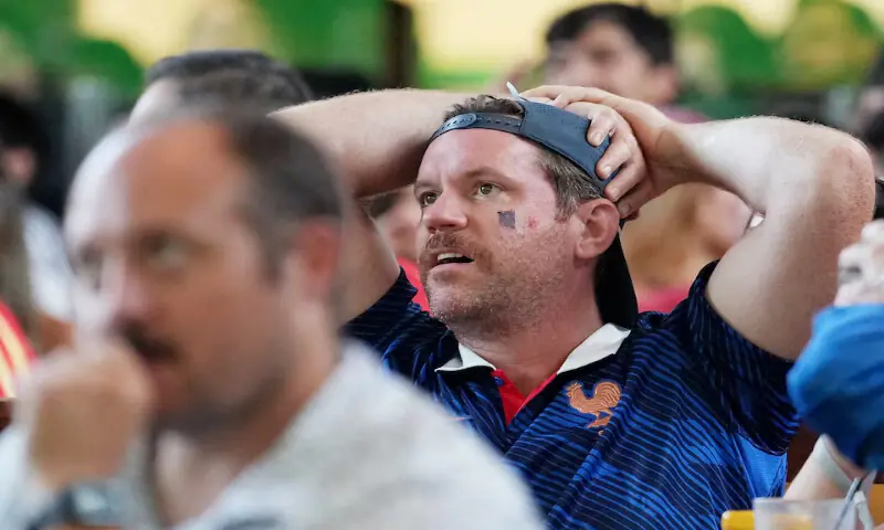A France fan reacts as he watches the match at Texas Live! in Dallas, Texas. -- Reuters