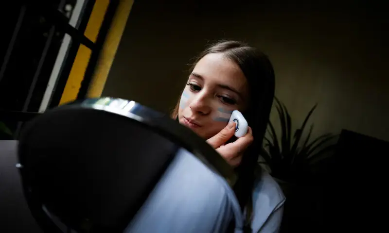 Ines Mutri, 13, looks at herself in a mirror after painting her face with the colours of the Argentine national flag to show one of her good-luck rituals when watching Argentina's matches during the FIFA World Cup 2026, in Buenos Aires, Argentina. -- Reuters Ines Mutri, 13, looks at herself in a mirror after painting her face with the colours of the Argentine national flag to show one of her good-luck rituals when watching Argentina's matches during the FIFA World Cup 2026, in Buenos Aires, Argentina. -- Reuters