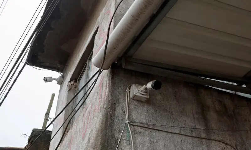 CCTV cameras are attached to a wall outside a shop inside a market, following the rape and murder of an 11-year-old girl that took place in a town near Kolkata, India. -- Reuters CCTV cameras are attached to a wall outside a shop inside a market, following the rape and murder of an 11-year-old girl that took place in a town near Kolkata, India. -- Reuters