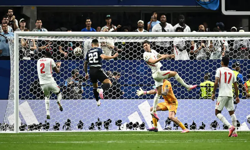 Argentina's Lautaro Martinez scores their second goal. -- Reuters