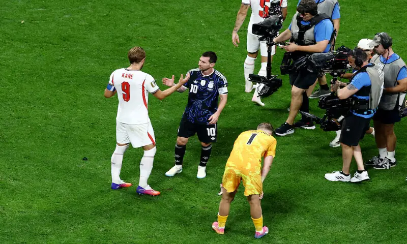 England's Harry Kane shakes hands with Argentina's Lionel Messi after Argentina qualify for the World Cup final. -- Reuters