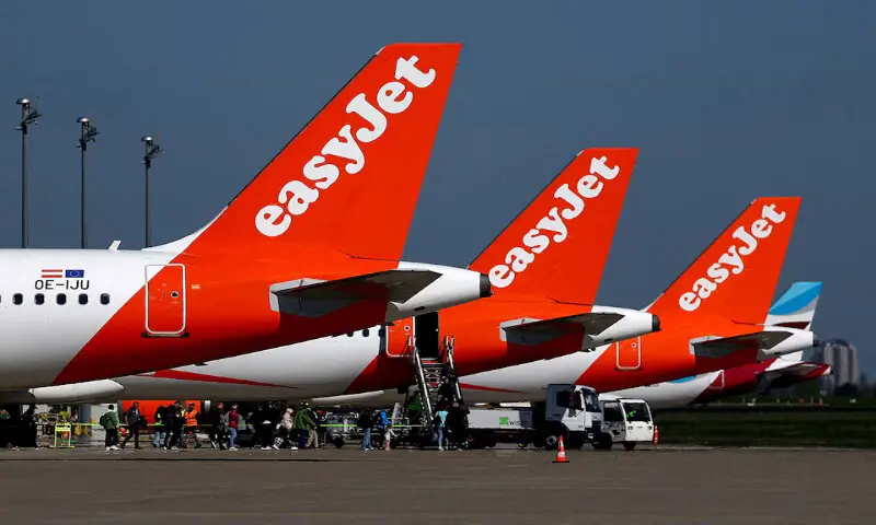 Passengers board an easyJet aircraft at the Berlin Brandenburg Airport in Schoenefeld, Germany. -- Reuters file