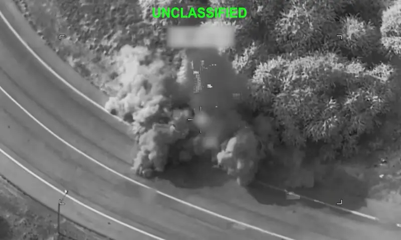 Smoke rises following a strike at an unknown location during what the US military says is its latest wave of strikes on Iran, hitting "Iranian military targets such as coastal surveillance and air defence sites, military logistics infrastructure, and maritime capabilities," in this still image taken from a handout video released July 16, 2026. US Central Command/Handout via Reuters