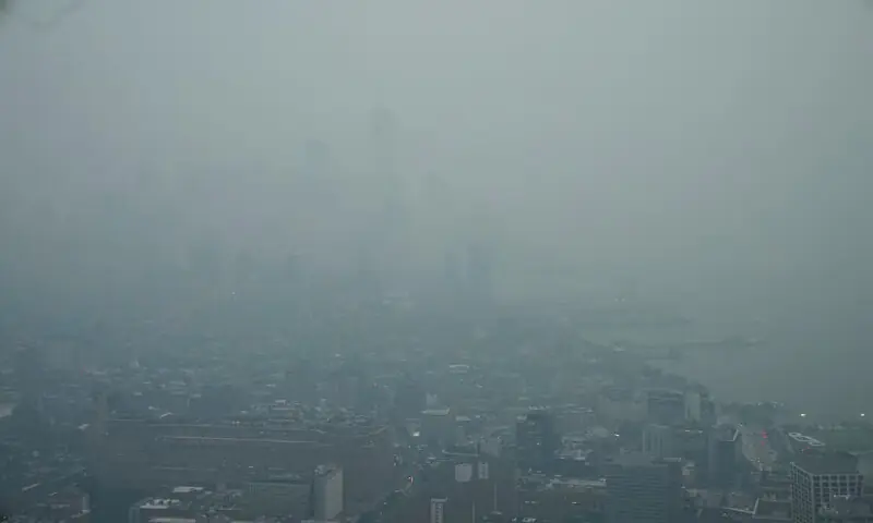 The New York City skyline and the One World Trade Centre are seen from the Edge observation deck through a cover of wildfire smoke in New York City. -- Reuters
