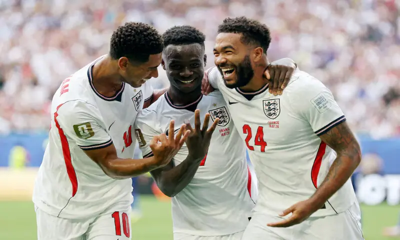 England's Bukayo Saka celebrates scoring their fifth goal to complete a hat-trick with Jude Bellingham and Reece James. -- Reuters England's Bukayo Saka celebrates scoring their fifth goal to complete a hat-trick with Jude Bellingham and Reece James. -- Reuters