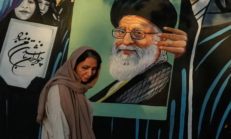 A woman walks past a mural depicting a portrait of the late Iranian Supreme Leader Ayatollah Ali Khamenei in downtown Tehran, Iran. -- Reuters A woman walks past a mural depicting a portrait of the late Iranian Supreme Leader Ayatollah Ali Khamenei in downtown Tehran, Iran. -- Reuters