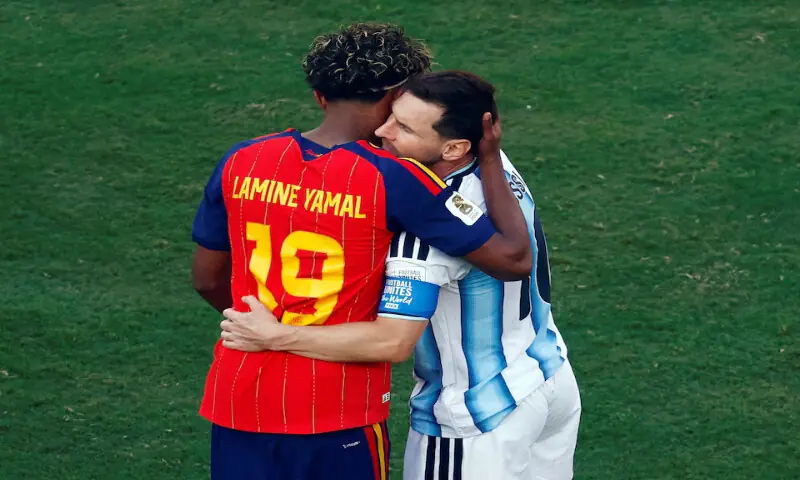Spain's Lamine Yamal and Argentina's Lionel Messi embrace after the match. -- Reuters Spain's Lamine Yamal and Argentina's Lionel Messi embrace after the match. -- Reuters
