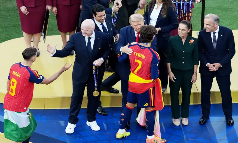 Spain's Ferran Torres and Fabian Ruiz receive the winner's medal from FIFA President Gianni Infantino and US President Donald Trump during the trophy presentation next to Canada's Prime Minister Mark Carney and Mexico's President Claudia Sheinbaum. -- Reuters Spain's Ferran Torres and Fabian Ruiz receive the winner's medal from FIFA President Gianni Infantino and US President Donald Trump during the trophy presentation next to Canada's Prime Minister Mark Carney and Mexico's President Claudia Sheinbaum. -- Reuters