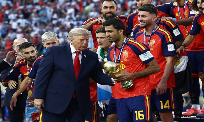 Spain's Rodri holds the World Cup trophy with US President Donald Trump during the trophy presentation ceremony. -- Reuters Spain's Rodri holds the World Cup trophy with US President Donald Trump during the trophy presentation ceremony. -- Reuters