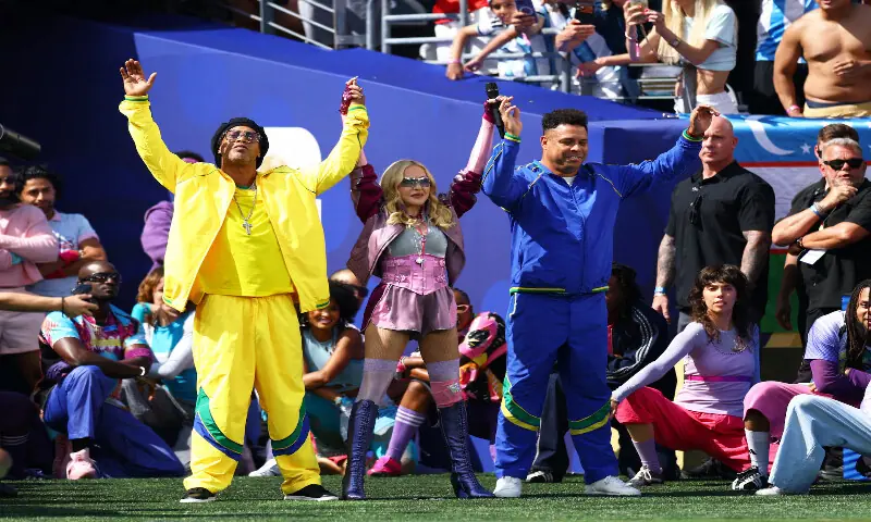 Madonna with former Brazil players Ronaldinho and Ronaldo duringb the ceremony. -- Reuters Madonna with former Brazil players Ronaldinho and Ronaldo duringb the ceremony. -- Reuters