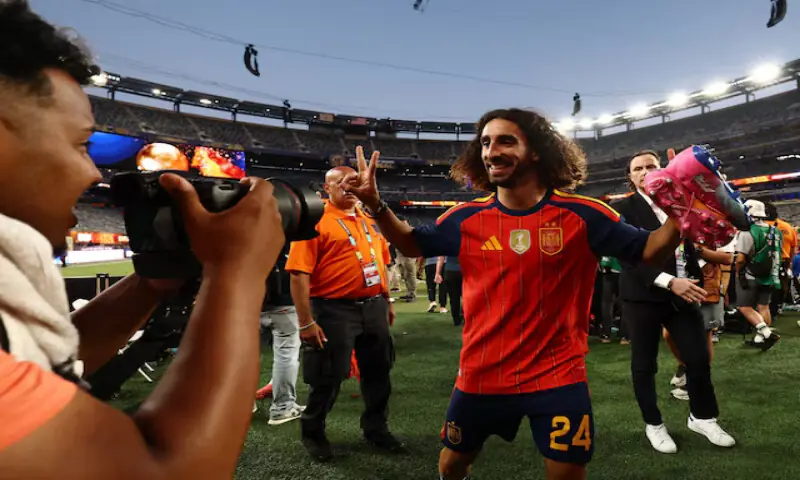Spain's Marc Cucurella celebrates with his medal after winning the World Cup. -- Reuters Spain's Marc Cucurella celebrates with his medal after winning the World Cup. -- Reuters