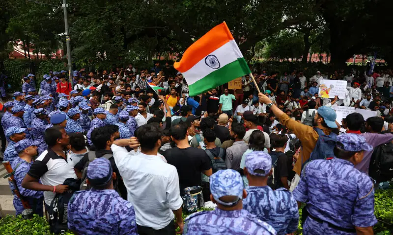A demonstrator waves an Indian flag at a protest site near Jantar Mantar, New Delhi, India, on Monday. -- Reuters A demonstrator waves an Indian flag at a protest site near Jantar Mantar, New Delhi, India, on Monday. -- Reuters