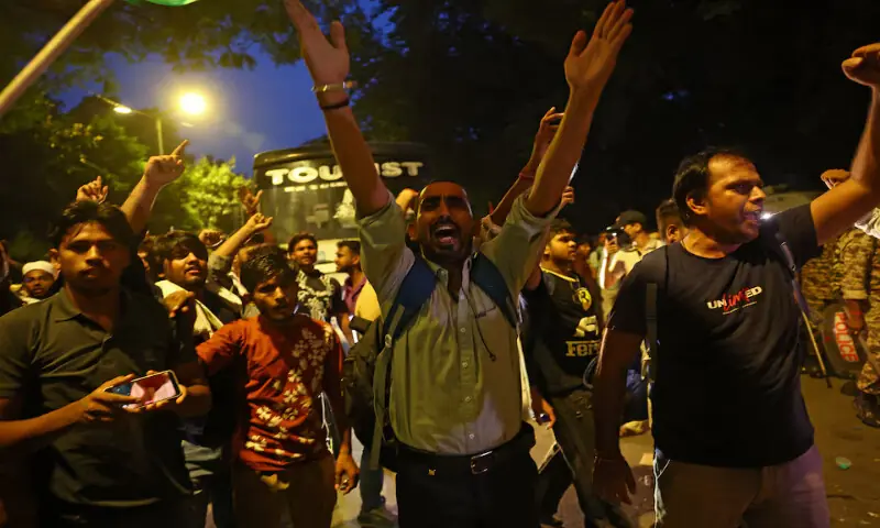 Demonstrators shout slogans at a protest site ahead of a planned march by supporters of India's Cockroach Janta Party towards parliament, demanding the resignation of Education Minister Dharmendra Pradhan over exam paper leaks near Jantar Mantar, New Delhi, India, on Monday. -- Reuters Demonstrators shout slogans at a protest site ahead of a planned march by supporters of India's Cockroach Janta Party towards parliament, demanding the resignation of Education Minister Dharmendra Pradhan over exam paper leaks near Jantar Mantar, New Delhi, India, on Monday. -- Reuters