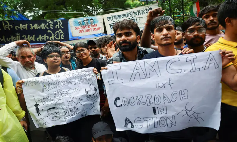 Supporters of Cockroach Janta Party hold placards at Jantar Mantar in New Delhi, India. -- Reuters Supporters of Cockroach Janta Party hold placards at Jantar Mantar in New Delhi, India. -- Reuters