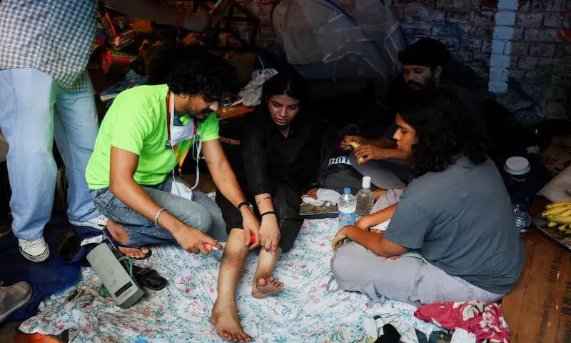 A supporter of India's Cockroach Janata Party receives medical treatment from a makeshift medical camp at the protest site at Jantar Mantar in New Delhi. -- Reuters A supporter of India's Cockroach Janata Party receives medical treatment from a makeshift medical camp at the protest site at Jantar Mantar in New Delhi. -- Reuters