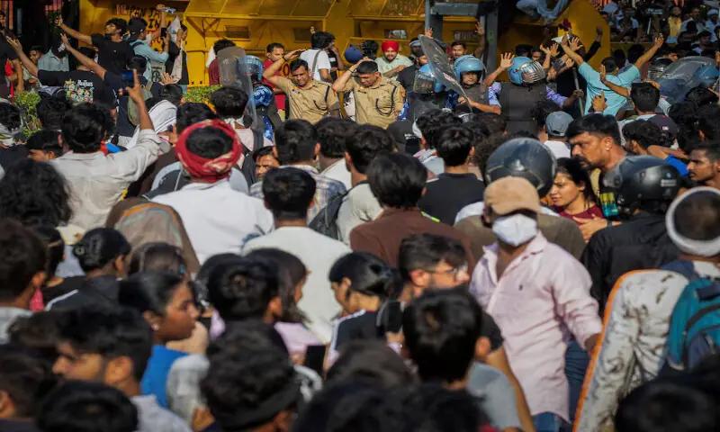 Police officers cover themselves with shields as they walk through the supporters of Cockroach Janata Party during the ongoing protest at Jantar Mantar in New Delhi, India. -- Reuters Police officers cover themselves with shields as they walk through the supporters of Cockroach Janata Party during the ongoing protest at Jantar Mantar in New Delhi, India. -- Reuters