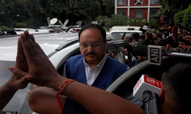 J.P. Nadda, India's senior federal minister, leaves after holding talks with spokespersons from the Cockroach Janta Party outside the Constitution club in New Delhi, India. -- Reuters