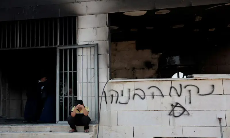 A Palestinian boy sits on the steps of mosque damaged by radical Israeli Jewish settlers in Qusra near Nablus, in the Israeli-occupied West Bank. -- Reuters A Palestinian boy sits on the steps of mosque damaged by radical Israeli Jewish settlers in Qusra near Nablus, in the Israeli-occupied West Bank. -- Reuters