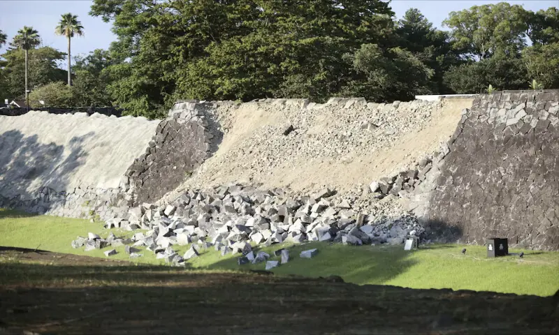 A collapsed part of Kumamoto Castle's stone walls after an earthquake in Kumamoto, Japan. -- Reuters