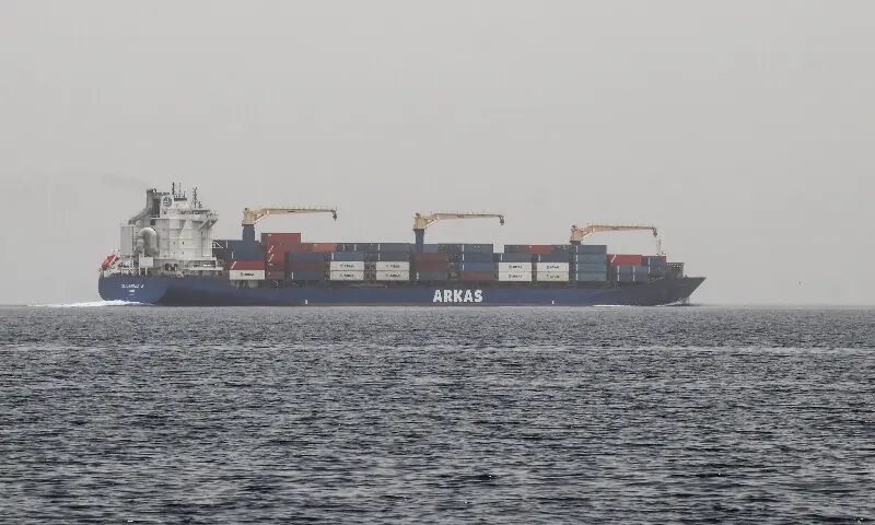 A commercial vessel passes through an international shipping lane off Yemen's Hanish Island in the Red Sea. -- AFP