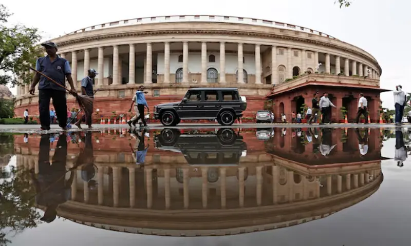 Parliament building is reflected in a puddle after the rain in New Delhi, India, on July 20, 2018. Reuters file
