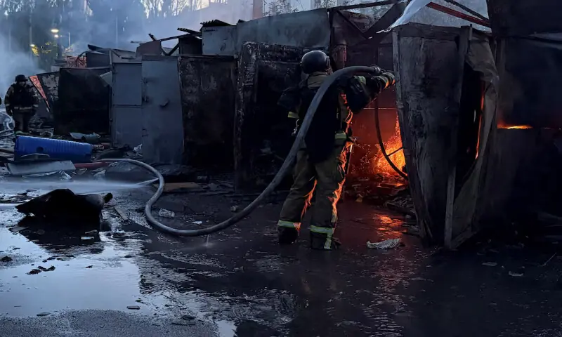 Firefighters work at the site of a Russian missile strike in Kyiv, Ukraine, on Thursday. -- Reuters Firefighters work at the site of a Russian missile strike in Kyiv, Ukraine, on Thursday. -- Reuters