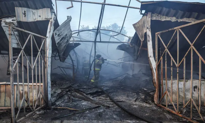 Firefighters work at a market damaged during Russian missile and drone strike in Kyiv, Ukraine, on Thursday. -- Reuters Firefighters work at a market damaged during Russian missile and drone strike in Kyiv, Ukraine, on Thursday. -- Reuters