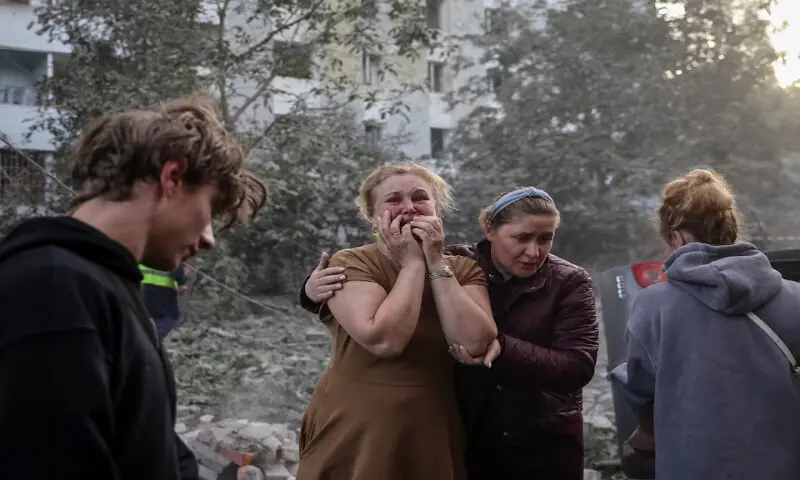 A woman reacts near an apartment building hit by a Russian missile strike in Lviv, Ukraine, on Thursday. -- Reuters A woman reacts near an apartment building hit by a Russian missile strike in Lviv, Ukraine, on Thursday. -- Reuters